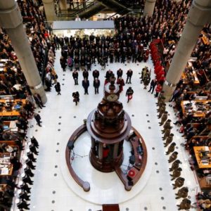 Lloyd's of London staff hold their annual Remembrance Day service at the Lloyd's building in the City of London, Britain November 11, 2015.  REUTERS/Stefan Wermuth